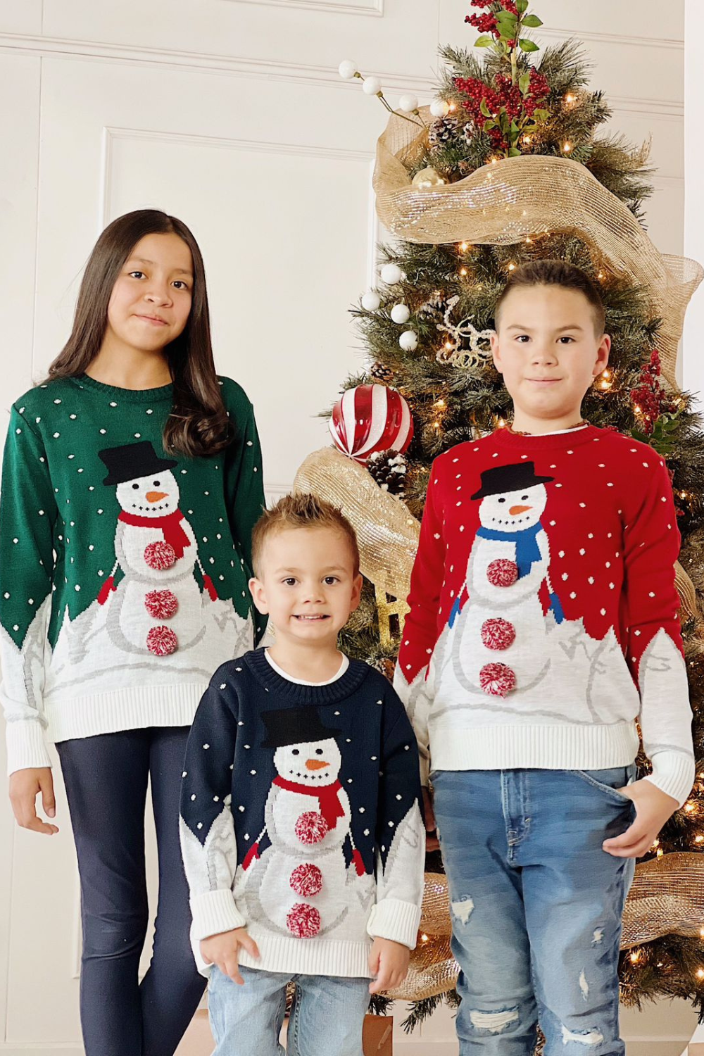 Suéter tejido Kids 2 a 10 años. Muñeco de nieve pompones