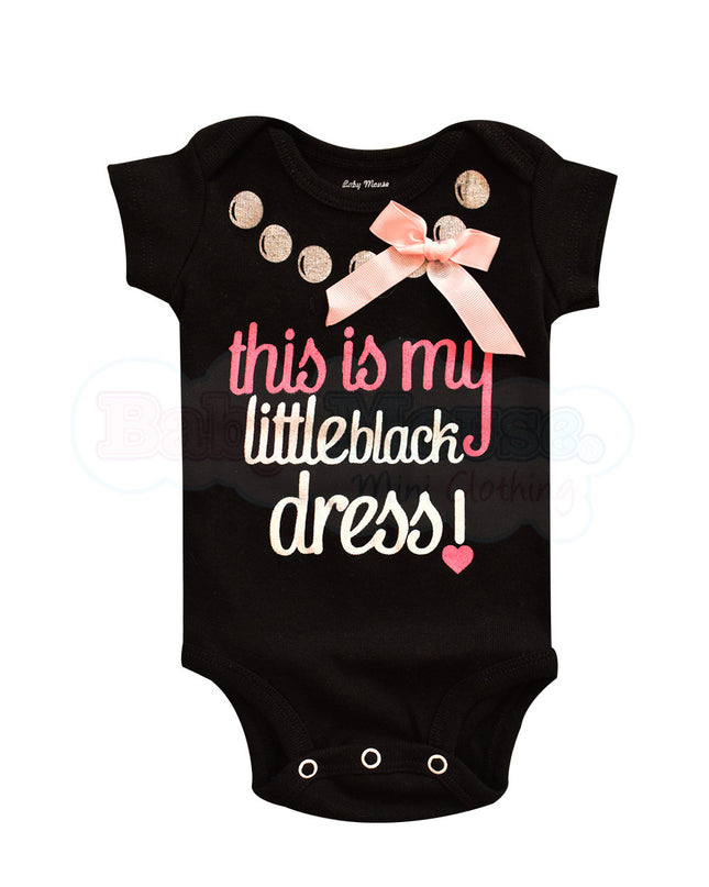 Pañalero Manga Corta Niña. Black dress.